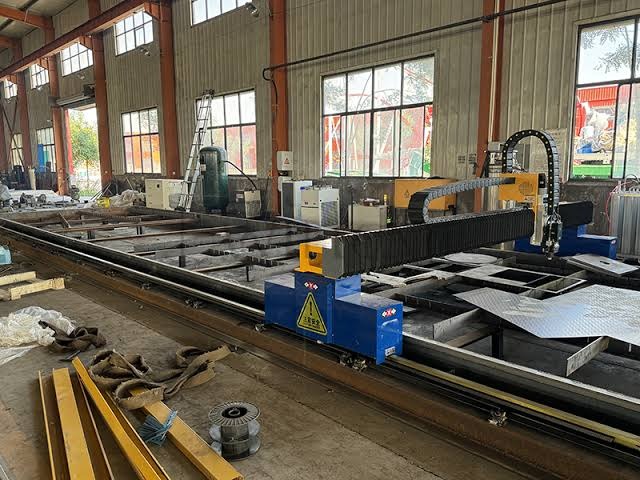 CNC plasma cutting machine at Dee Kay Traders Ghaziabad facility &mdash; large gantry CNC with active cutting head